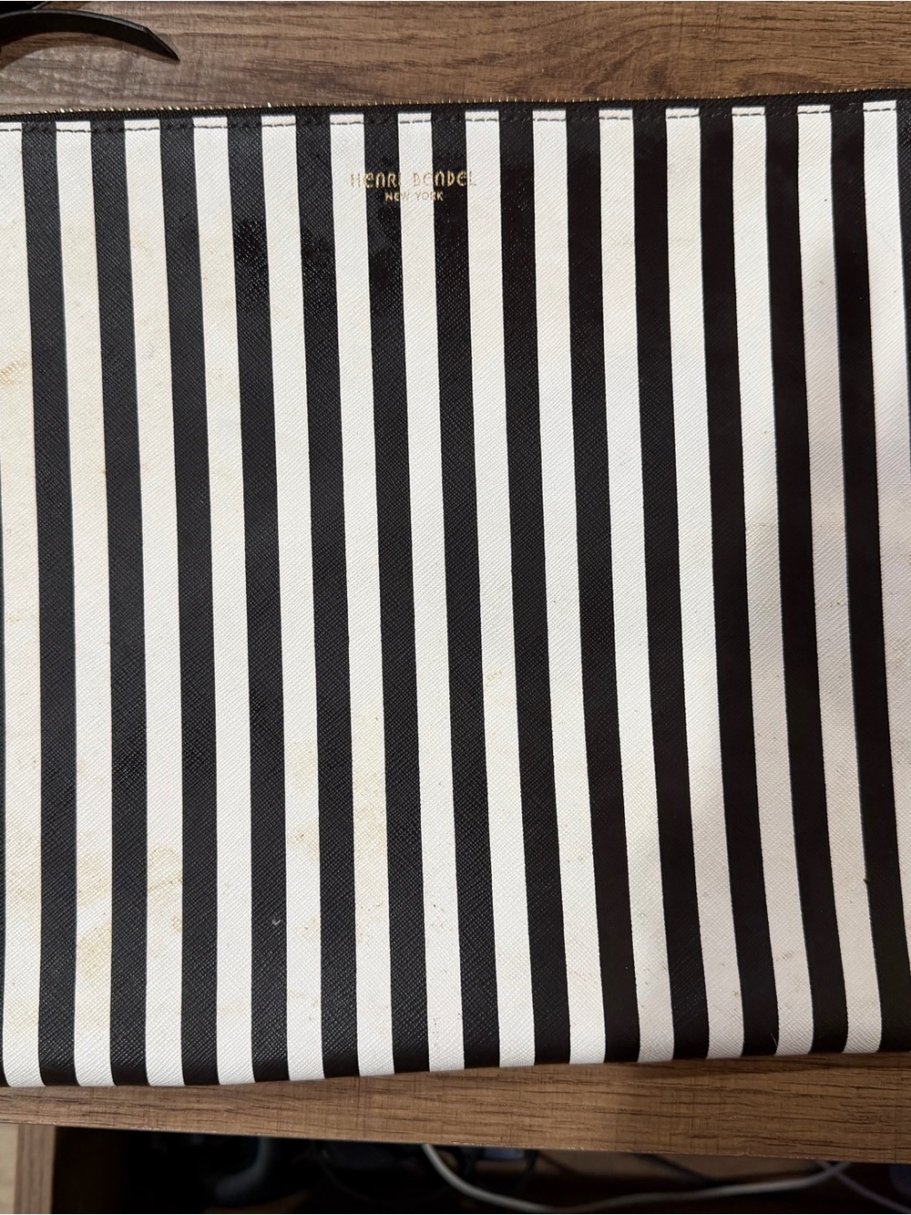 Henri Bendel laptop sleeve Dark Brown and White Striped.  Good condition.